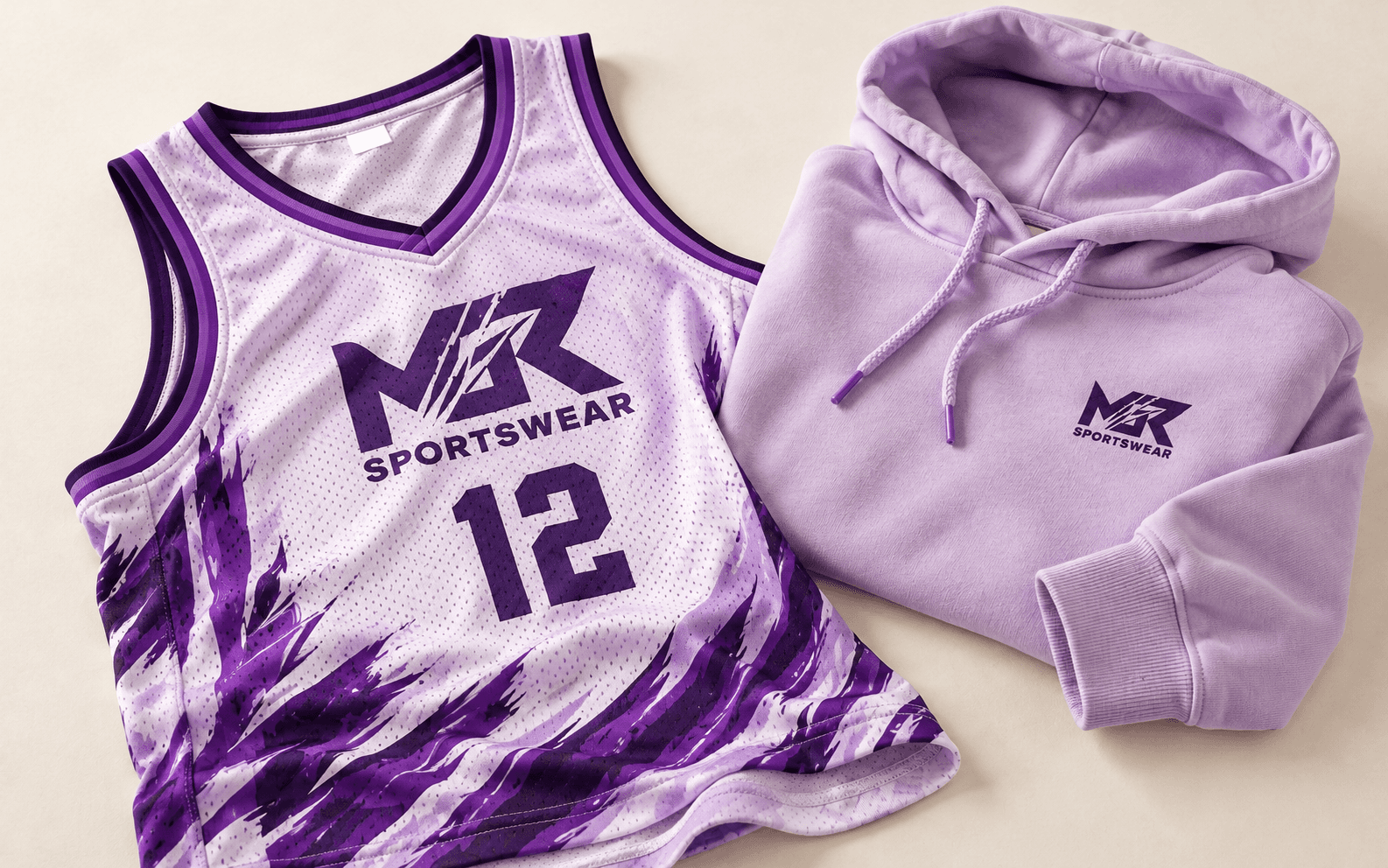 A lilac jersey and coordinated outerwear arranged to show their garment details.